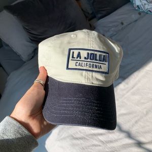 Navy and tan baseball hat